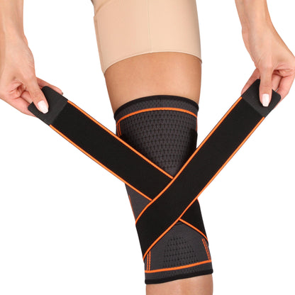 Genouillère Élastique avec Sangles de Compression INDIGO Noir-Orange.